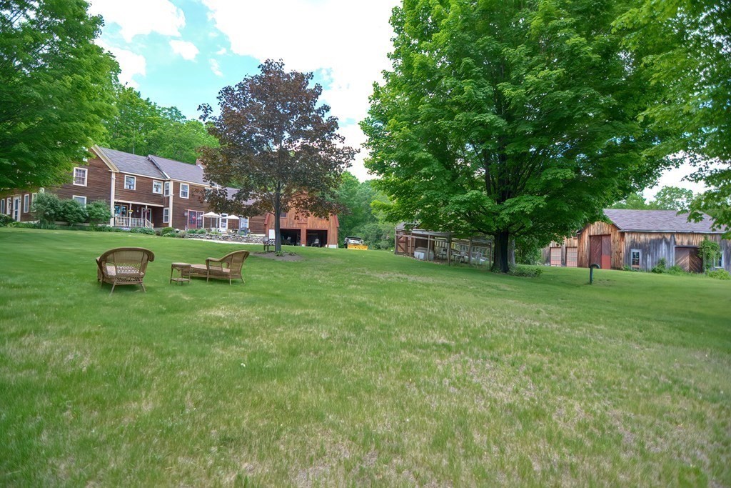 244 Davis Road Ashby, MA 01431 - Photo 32 of 35 a view of a house with a yard