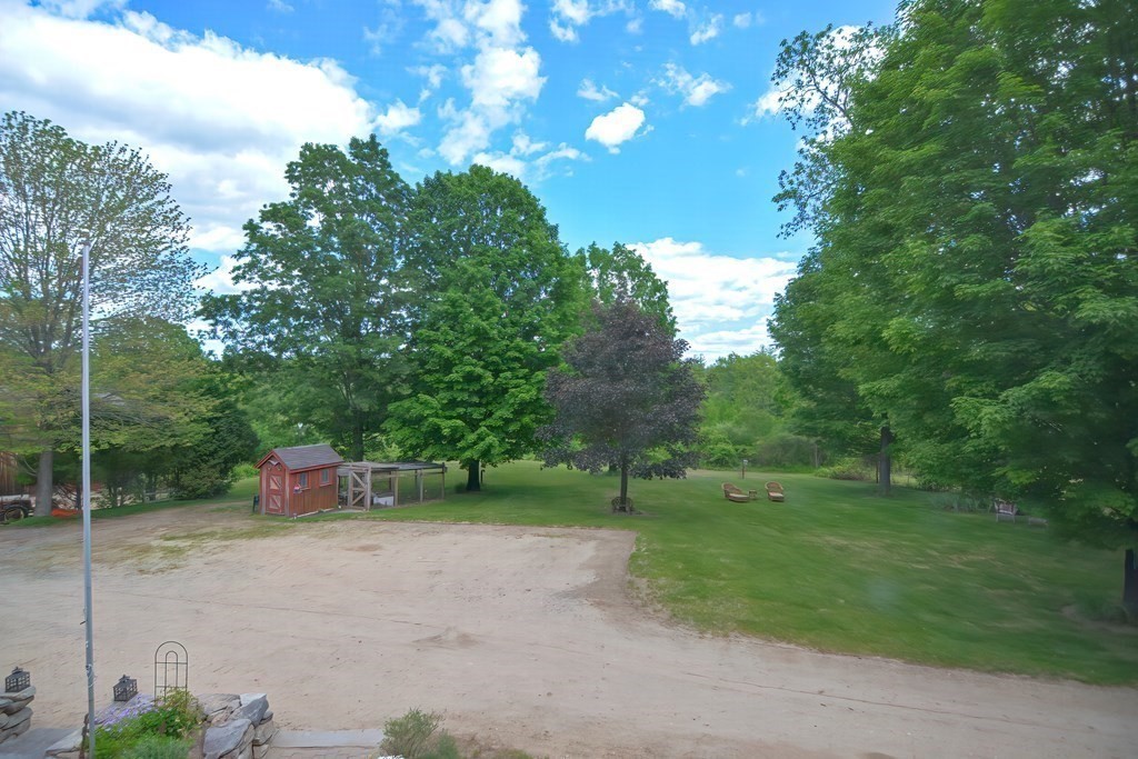 244 Davis Road Ashby, MA 01431 - Photo 33 of 35 a view of a field with tress in the background