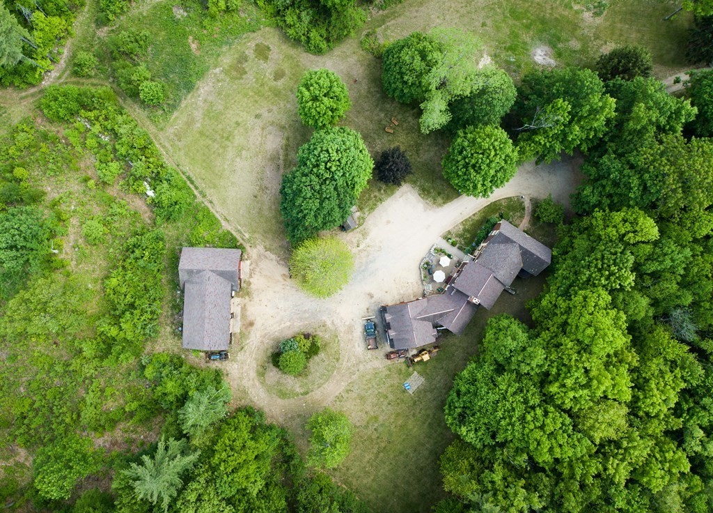 244 Davis Road Ashby, MA 01431 - Photo 34 of 35 an aerial view of residential house with outdoor space and trees all around