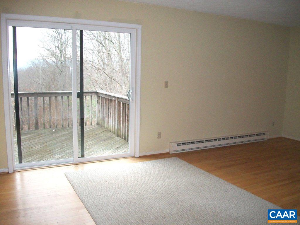 5584 Laurel Ridge Road Charlottesville, VA 22911 - Photo 11 of 28 a view of an empty room with a window
