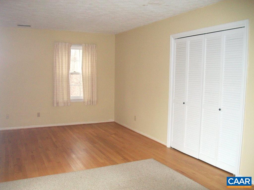 5584 Laurel Ridge Road Charlottesville, VA 22911 - Photo 17 of 28 an empty room with windows