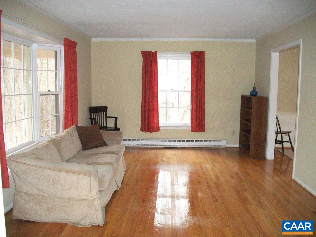 5584 Laurel Ridge Road Charlottesville, VA 22911 - Photo 5 of 28 a living room with furniture and a window