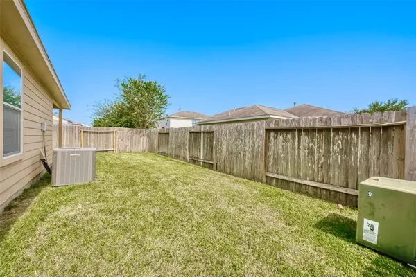 a view of a backyard with a garden