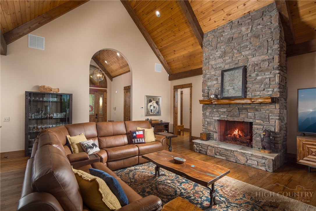 115 Passionflower Trail Boone, NC 28607 - Photo 3 of 50 a living room with furniture and a fireplace
