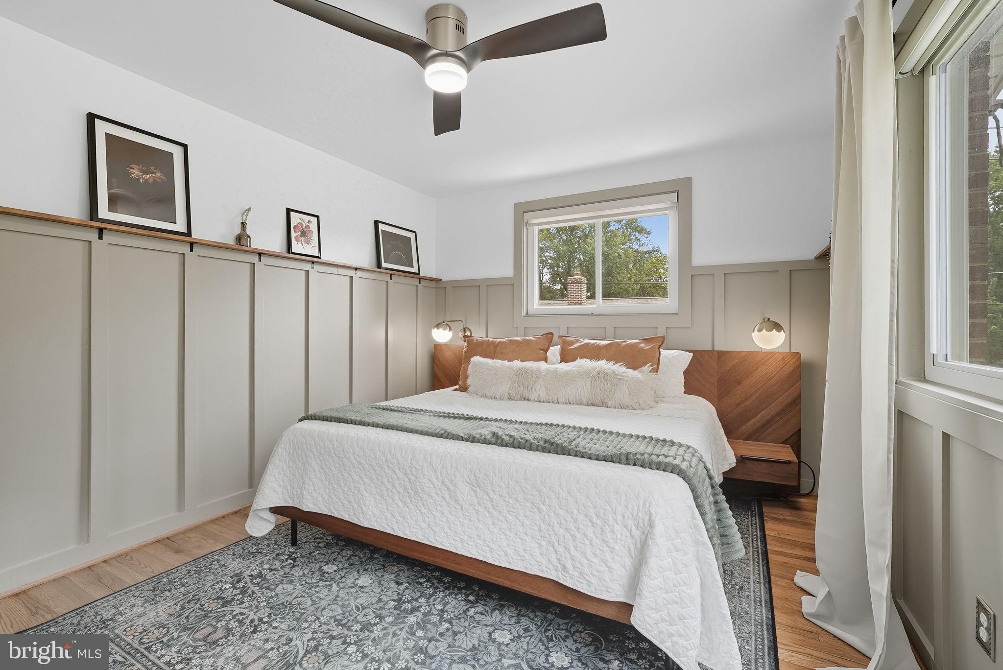 2411 Lillian Drive Silver Spring, MD 20902 - Photo 17 of 48 a bedroom with a large bed and a window