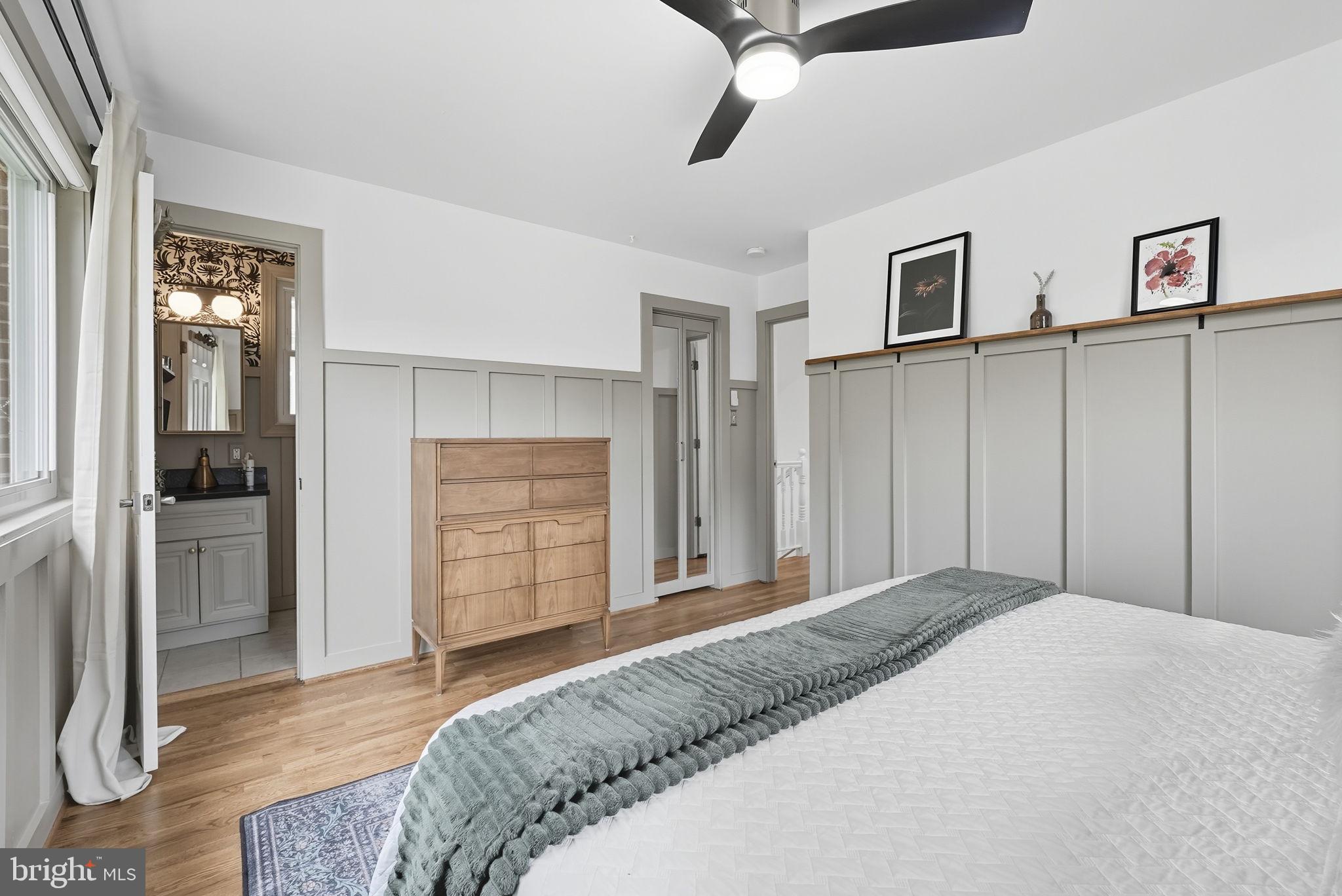 2411 Lillian Drive Silver Spring, MD 20902 - Photo 18 of 48 a bedroom with a bed and a television