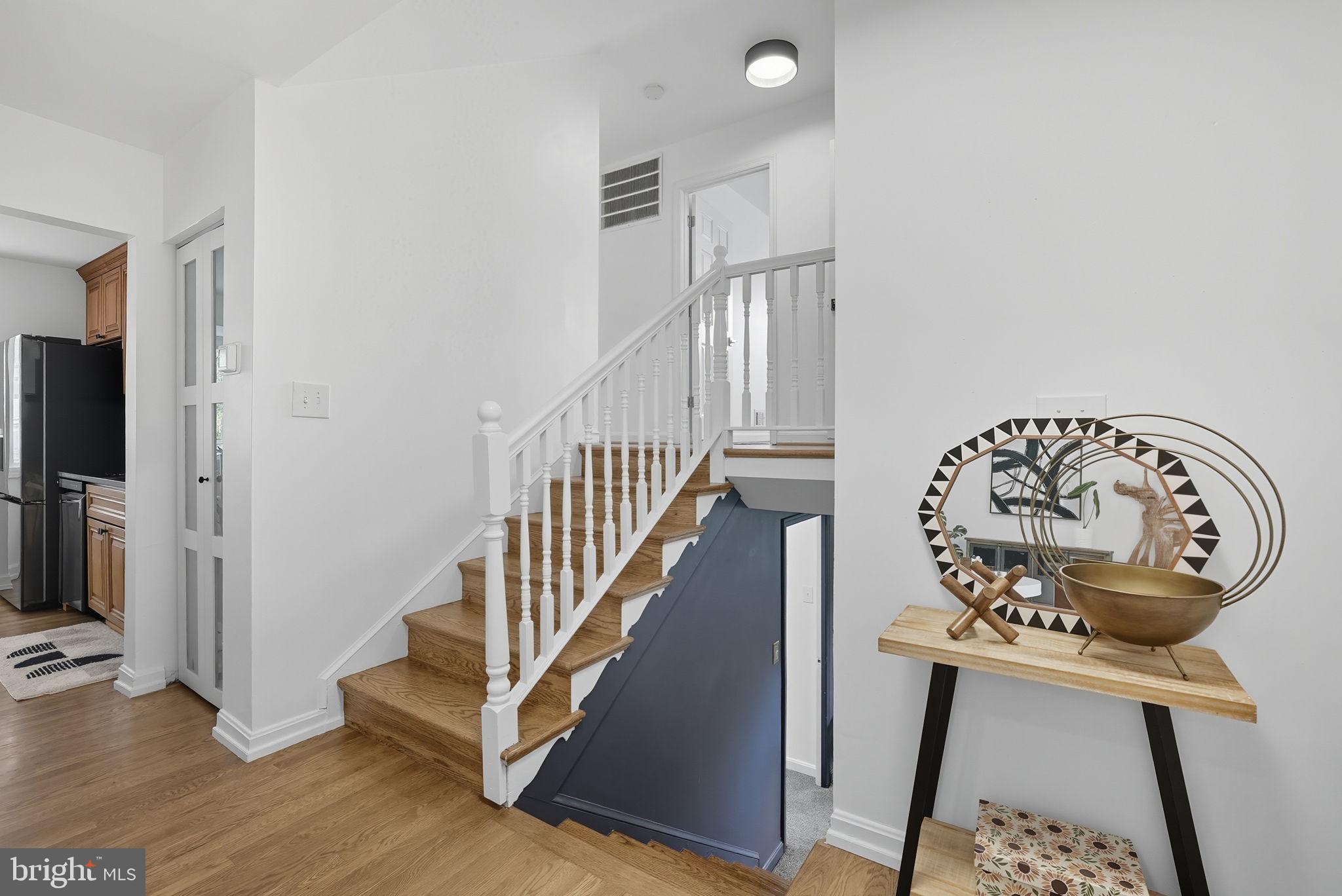 2411 Lillian Drive Silver Spring, MD 20902 - Photo 26 of 48 a view of a hallway with wooden floor