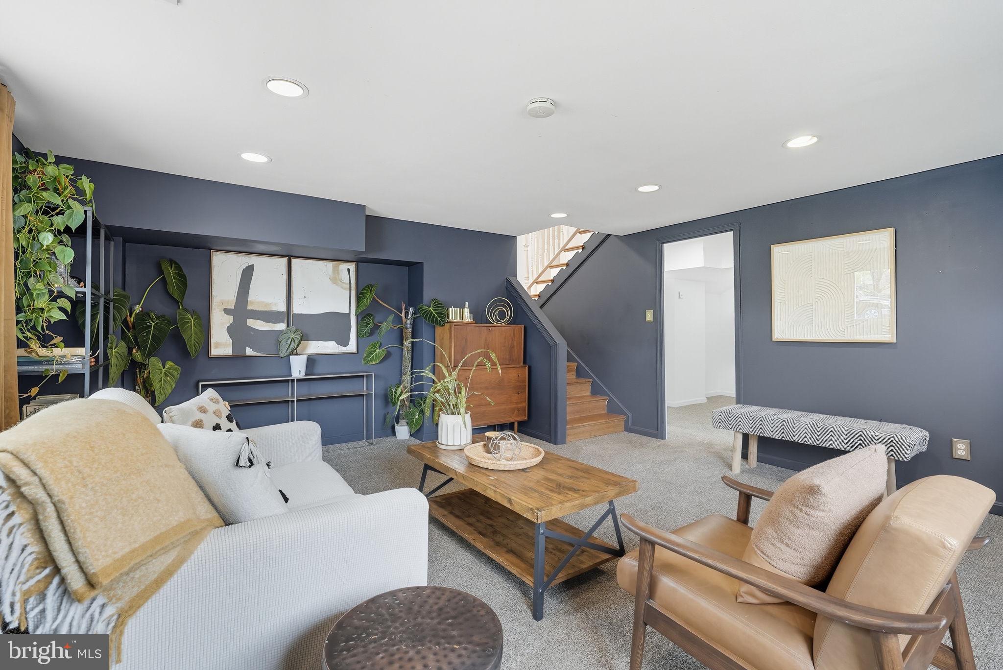 2411 Lillian Drive Silver Spring, MD 20902 - Photo 29 of 48 a living room with furniture and wooden floor