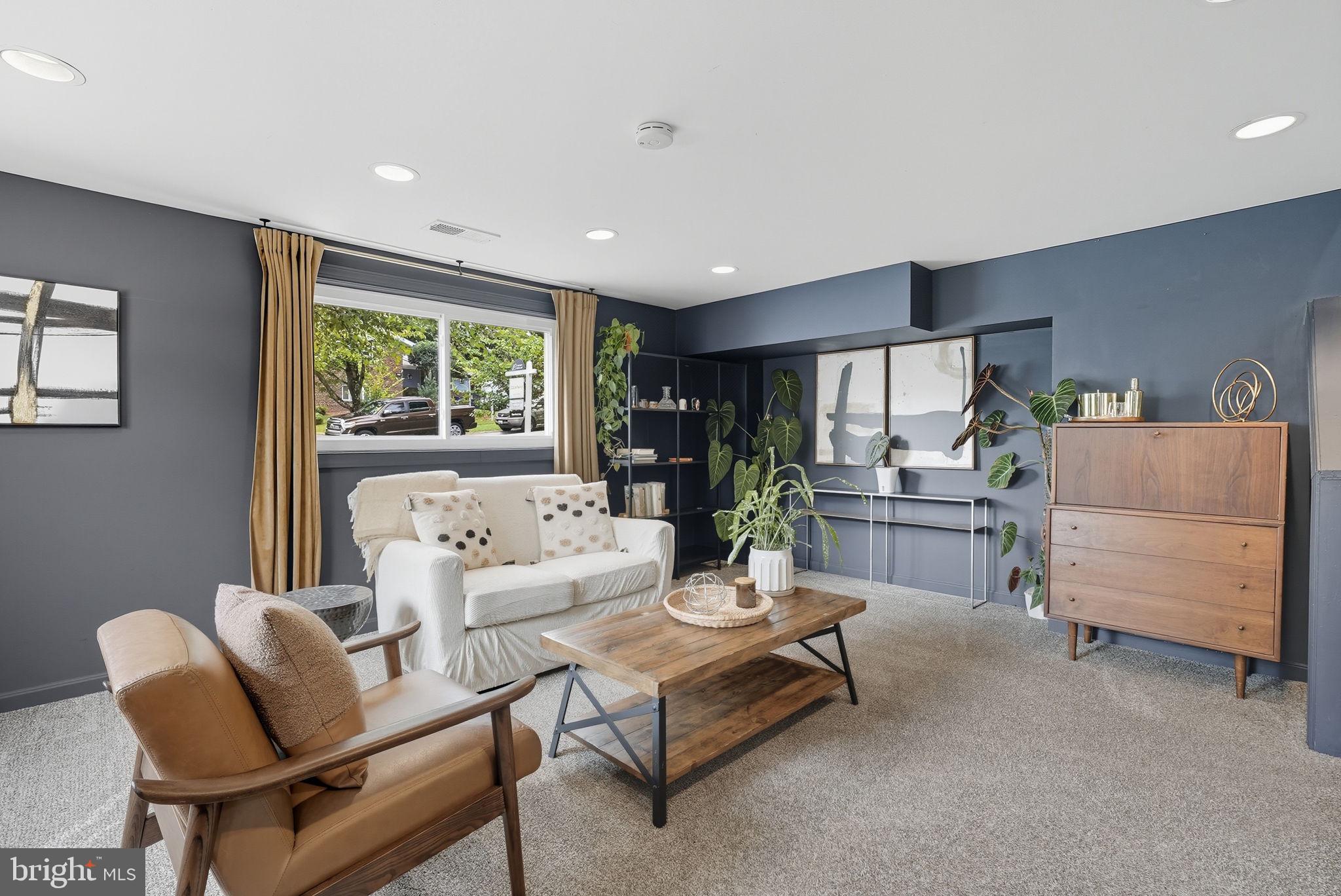 2411 Lillian Drive Silver Spring, MD 20902 - Photo 31 of 48 a living room with furniture and a window