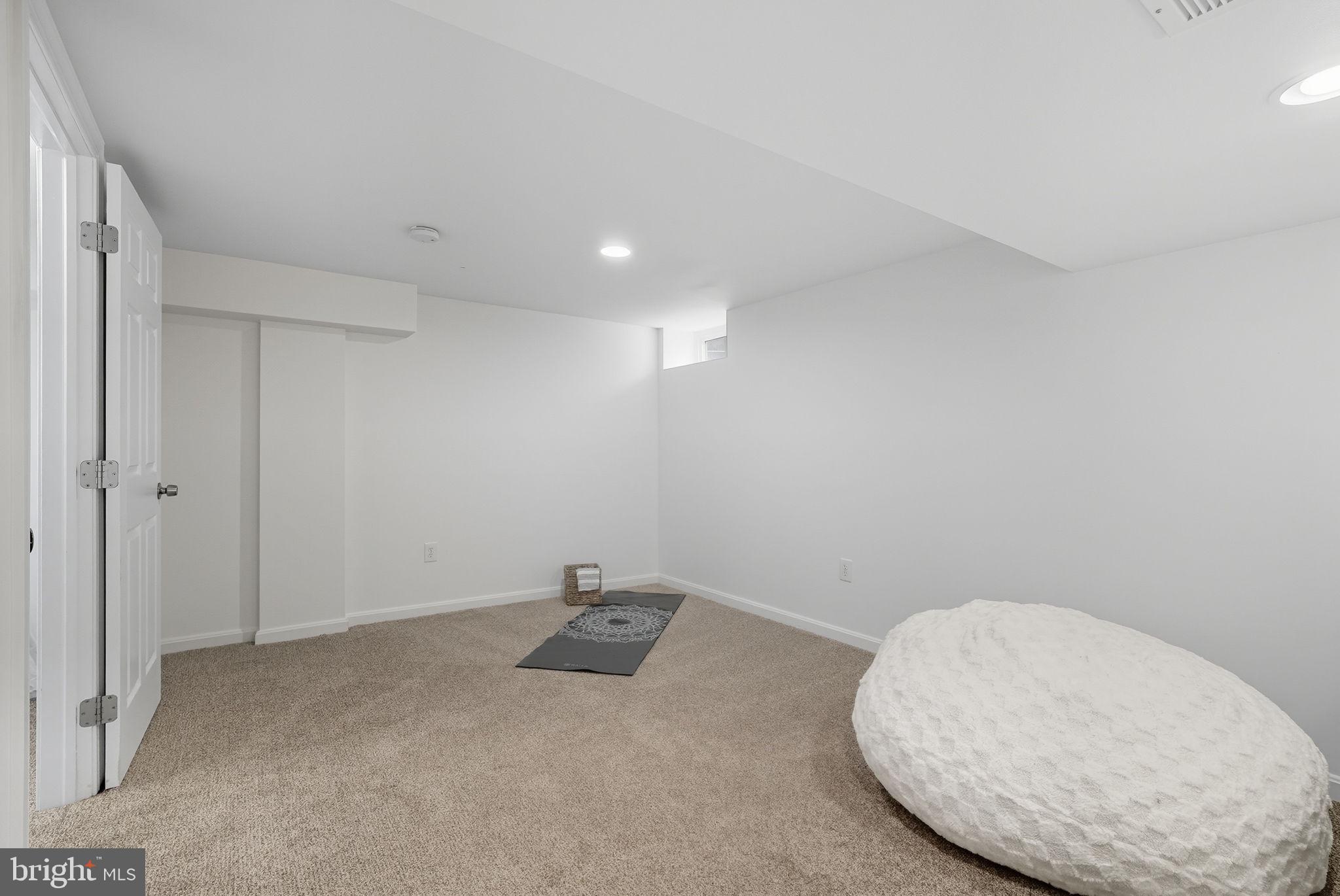 2411 Lillian Drive Silver Spring, MD 20902 - Photo 37 of 48 a view of a room with a wooden floor and bathroom