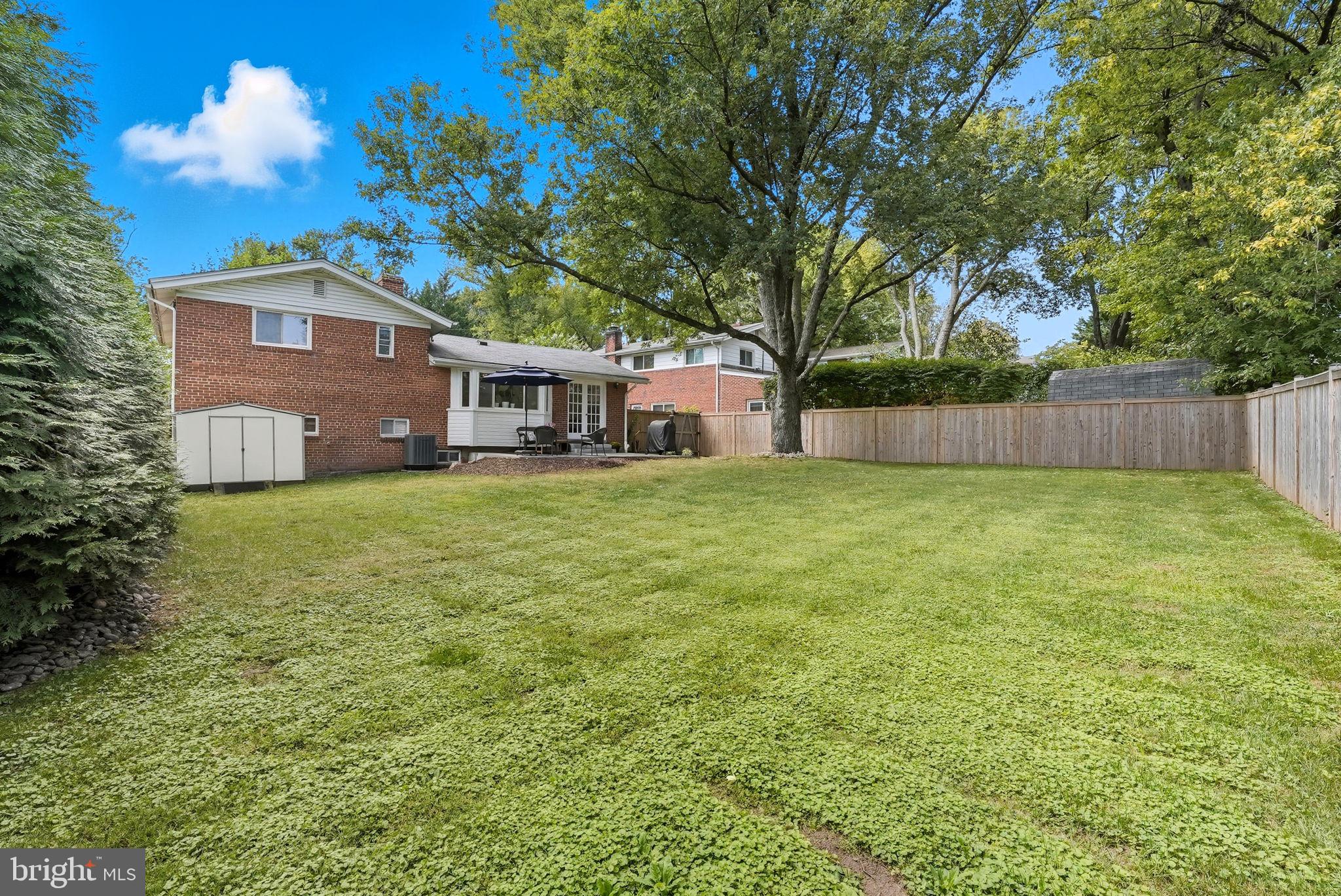 2411 Lillian Drive Silver Spring, MD 20902 - Photo 40 of 48 a view of a house with a yard porch and sitting area