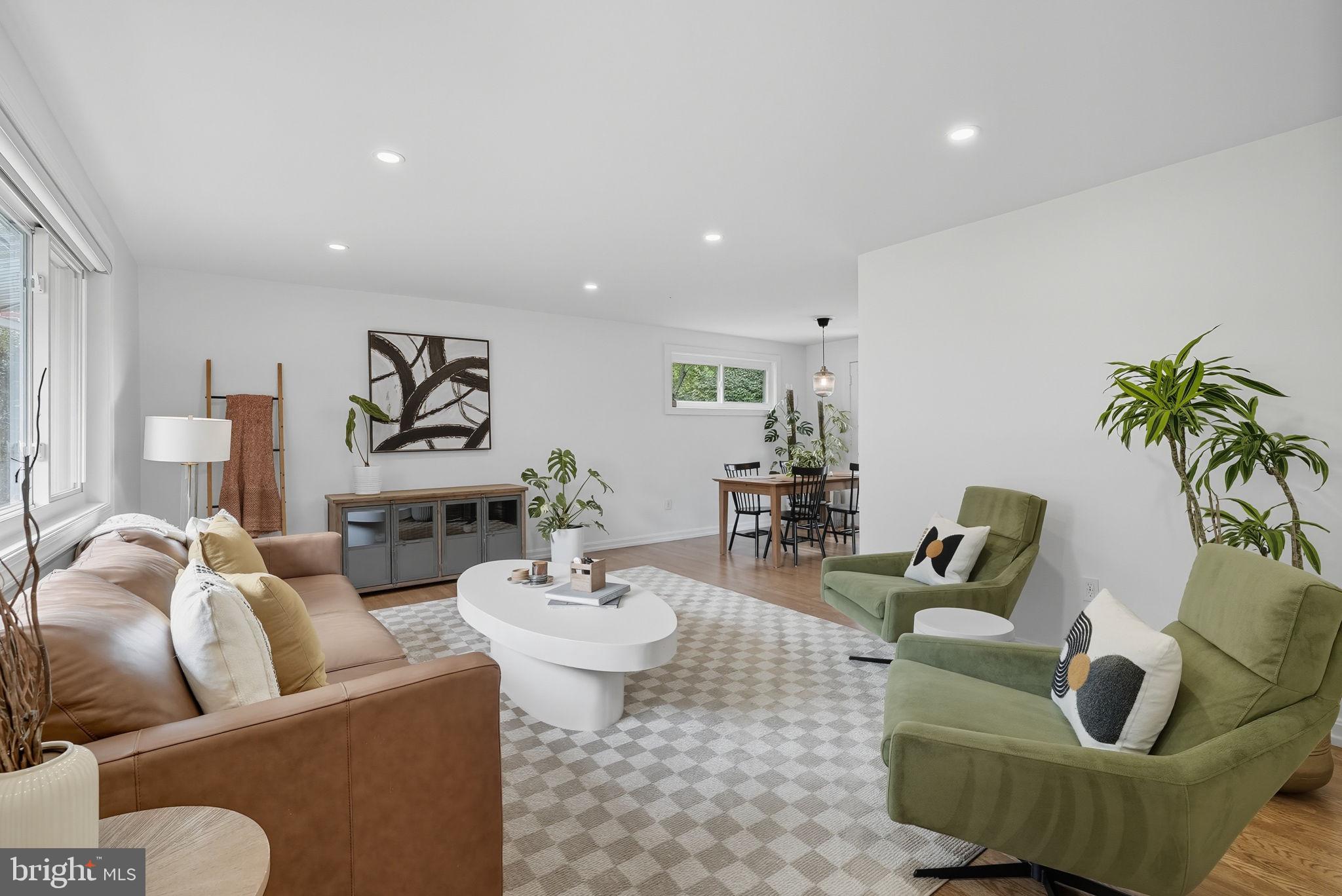 2411 Lillian Drive Silver Spring, MD 20902 - Photo 4 of 48 a living room with furniture and a potted plant