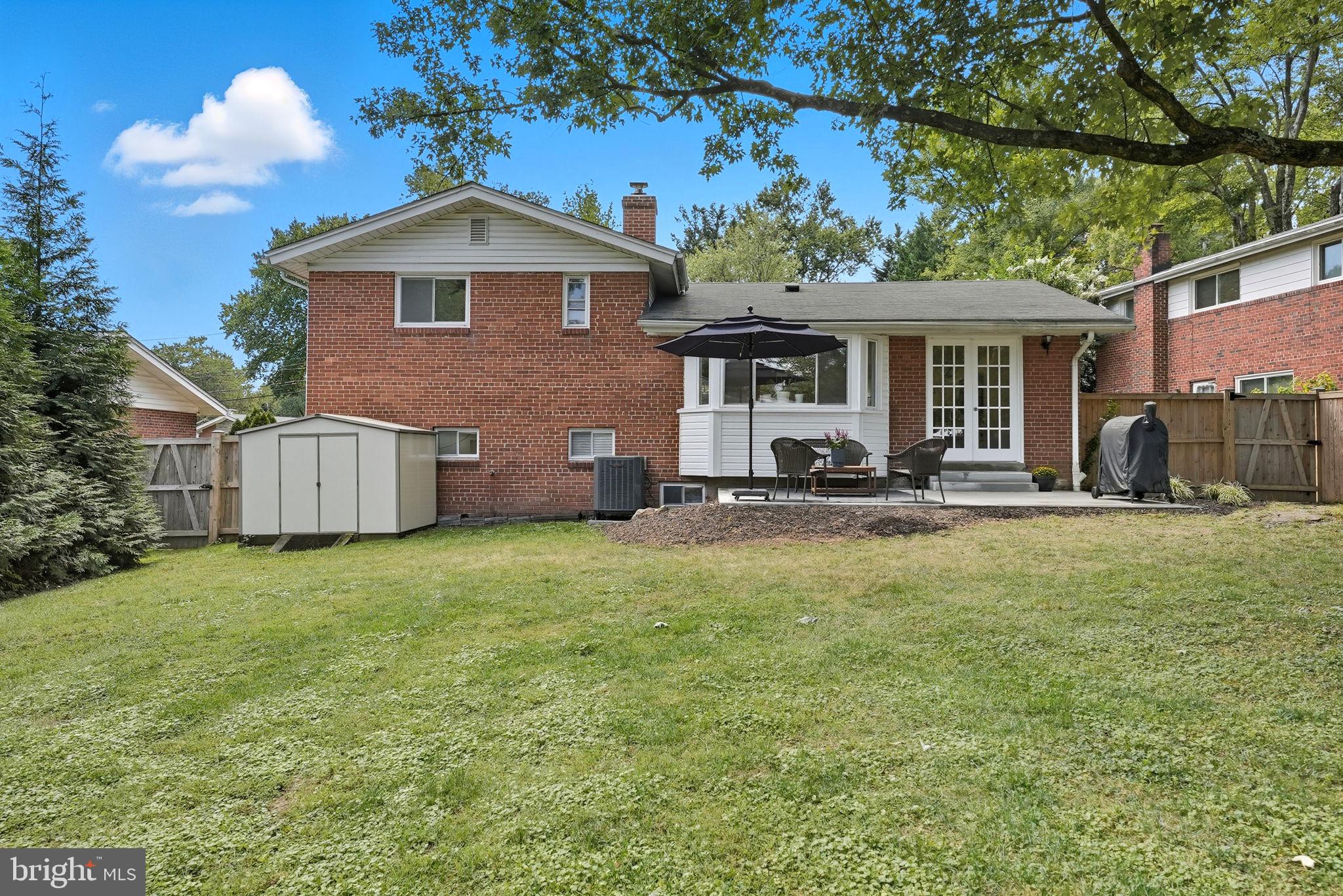 2411 Lillian Drive Silver Spring, MD 20902 - Photo 42 of 48 a front view of a house with a yard