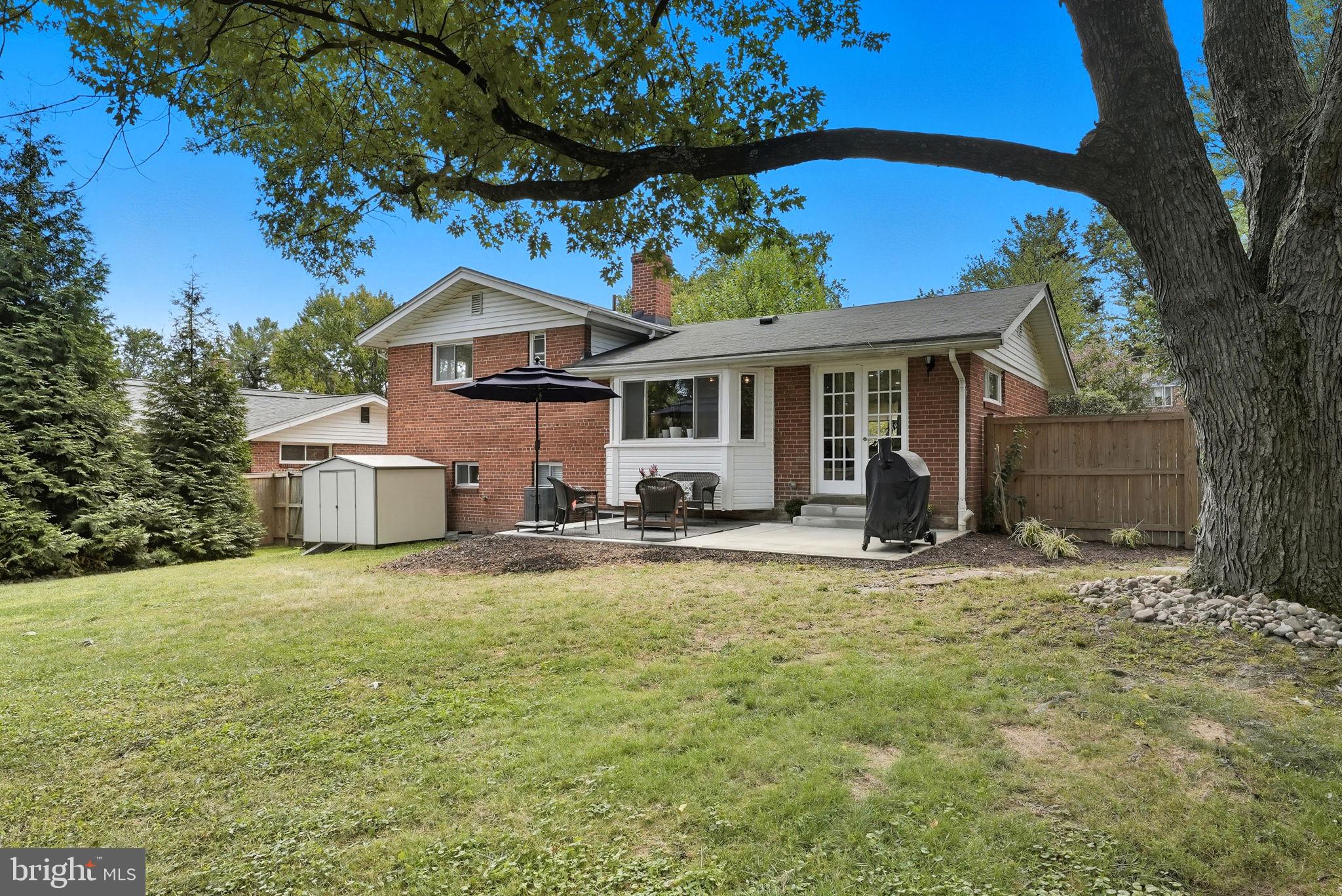 2411 Lillian Drive Silver Spring, MD 20902 - Photo 43 of 48 a front view of a house with patio