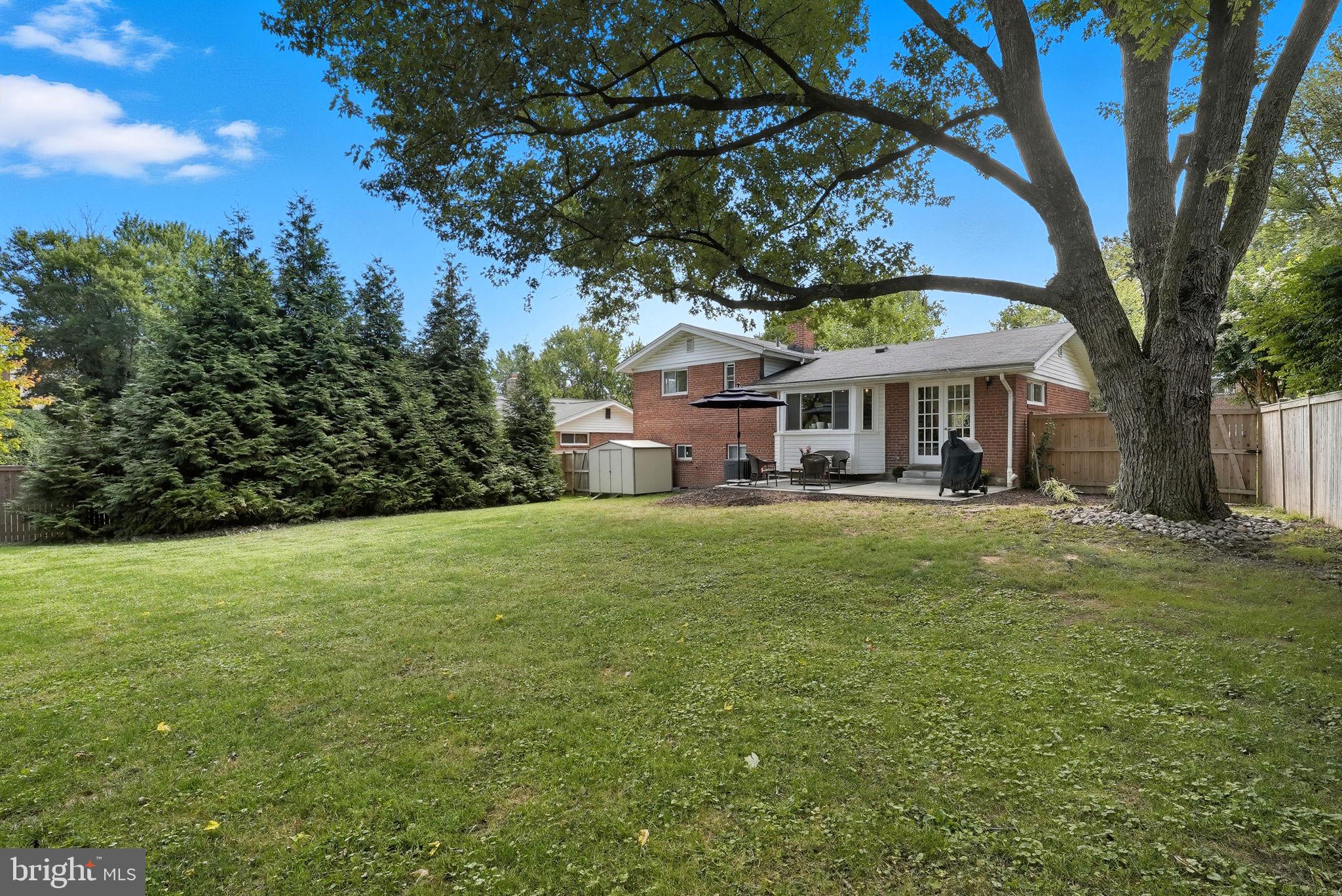 2411 Lillian Drive Silver Spring, MD 20902 - Photo 46 of 48 a front view of a house with a yard