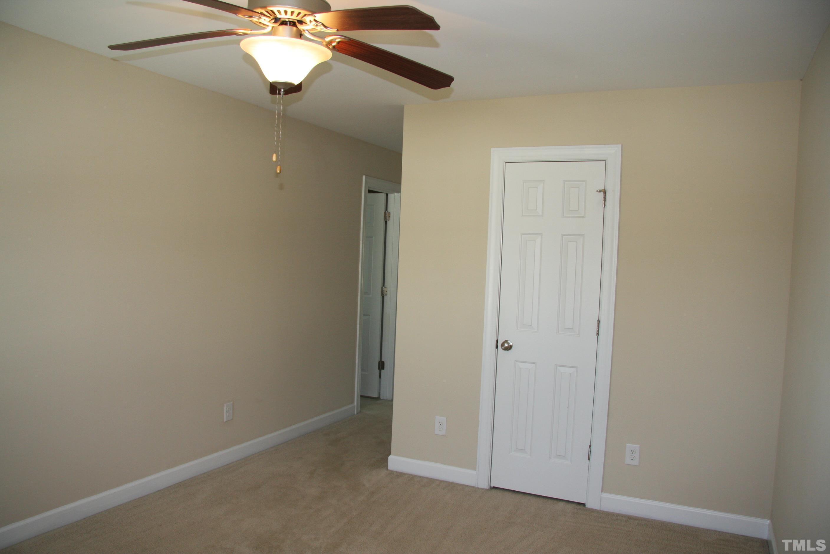 2021 Chancellor Place Raleigh, NC 27603 - Photo 18 of 30 an empty room with a fan and a fan