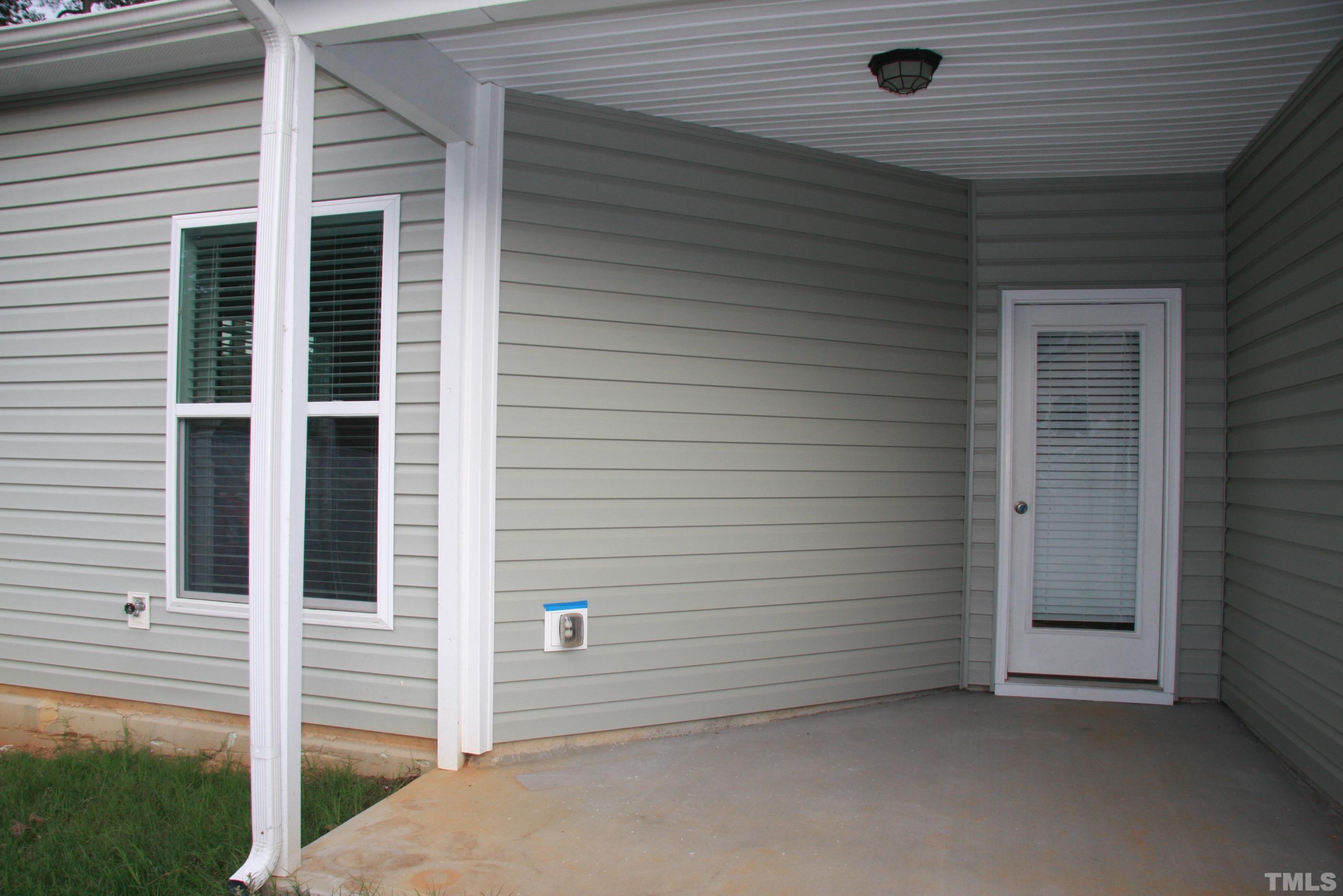 2021 Chancellor Place Raleigh, NC 27603 - Photo 29 of 30 a view of a house with white door