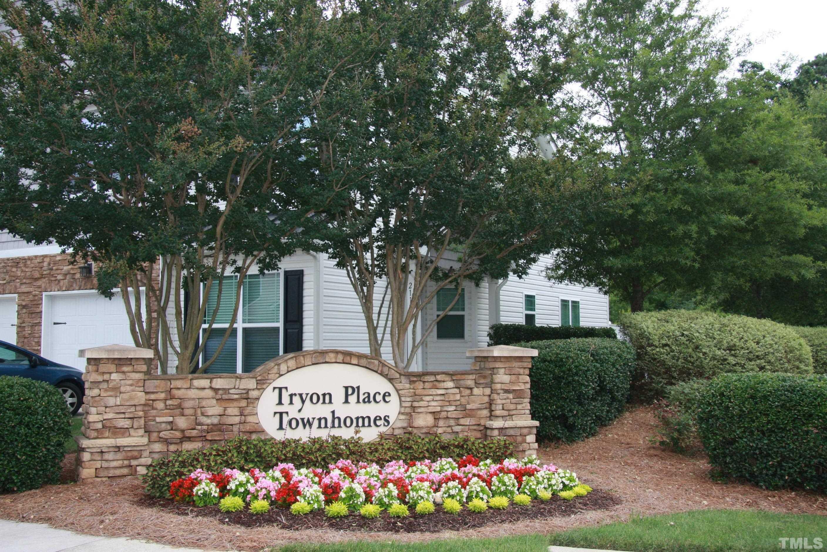 2021 Chancellor Place Raleigh, NC 27603 - Photo 30 of 30 a view of sign board with flower garden