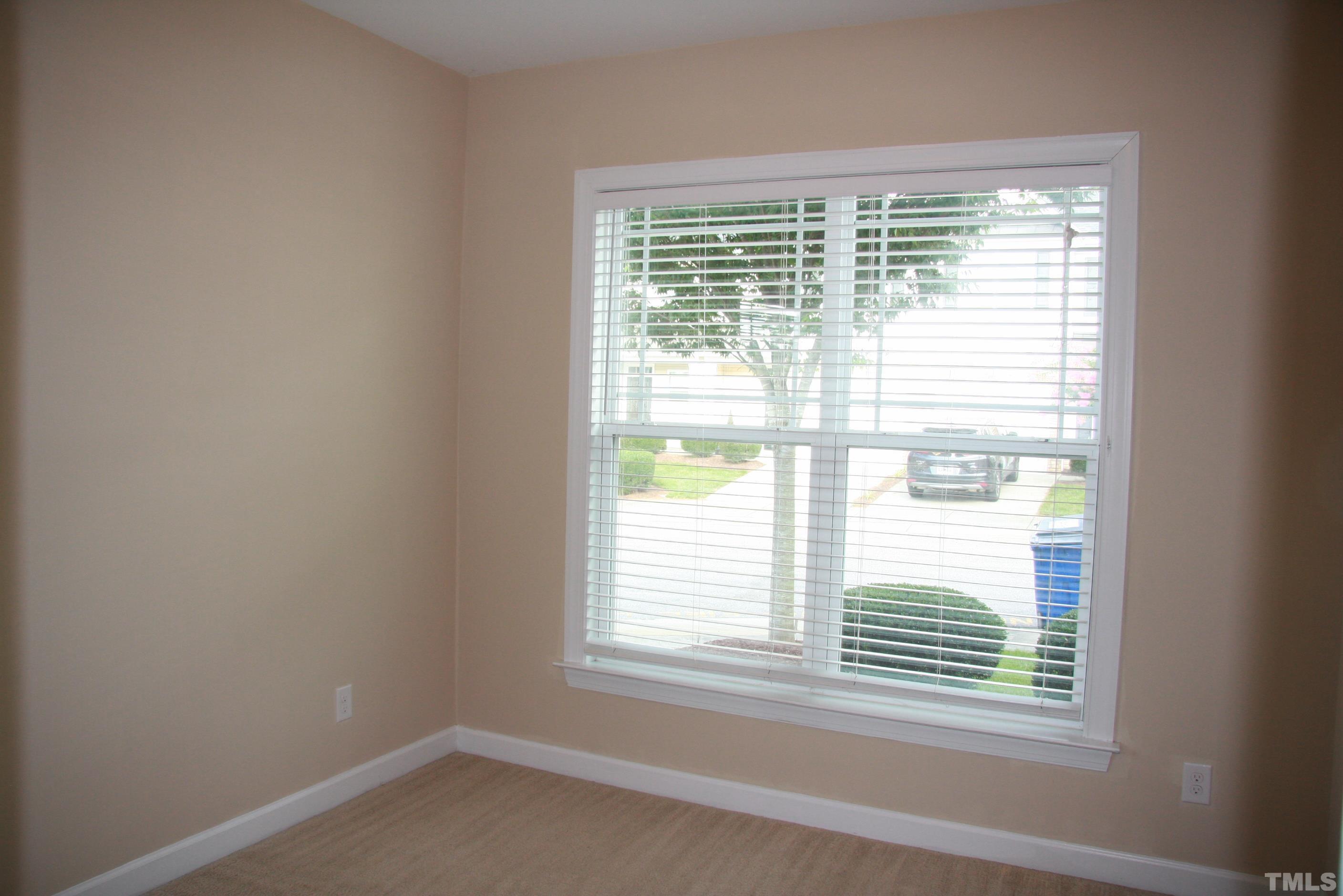 2021 Chancellor Place Raleigh, NC 27603 - Photo 5 of 30 a view of an empty room with a window