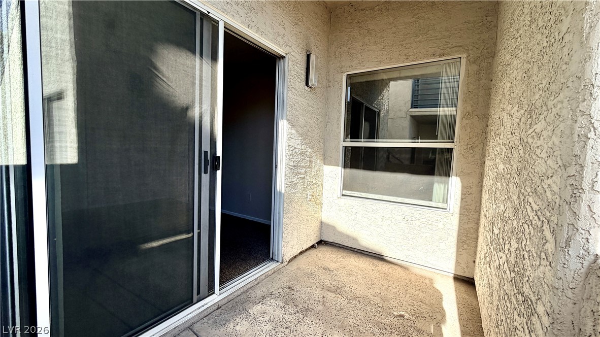 6250 West Flamingo Road, Unit 4 Las Vegas, NV 89103 - Photo 25 of 45 This private patio area provides a seamless transition from indoor comfort to outdoor relaxation.