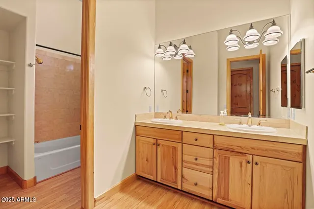 a bathroom with a toilet and a bathtub