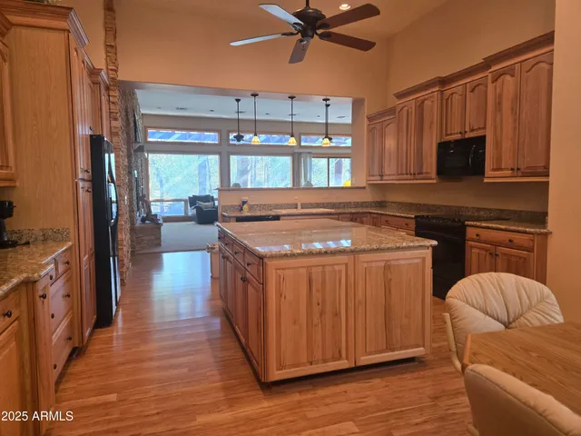 a backyard of a house with outdoor seating