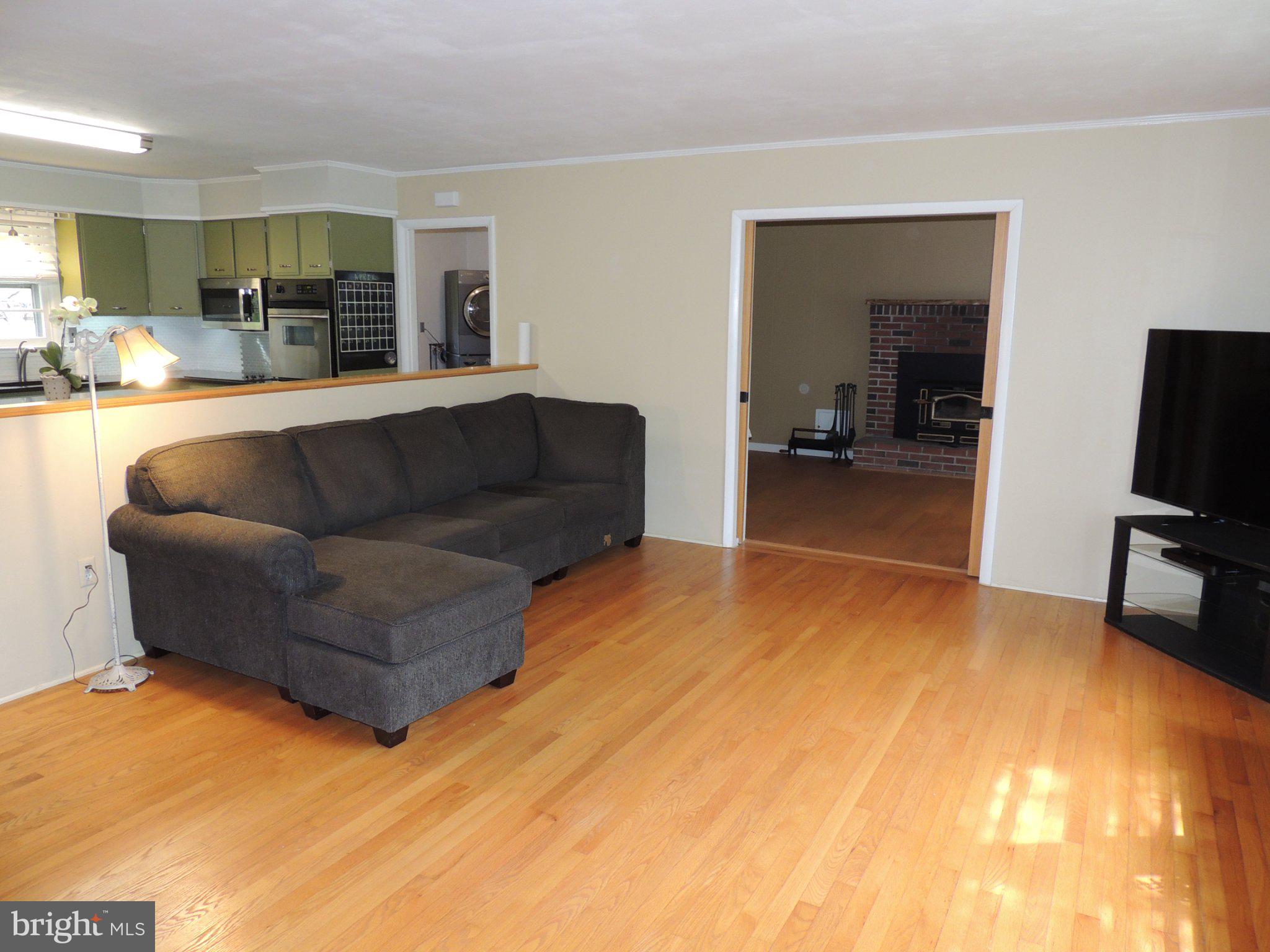 5838 Oklahoma Road Sykesville, MD 21784 - Photo 29 of 72 Spacious living area with warm tones.