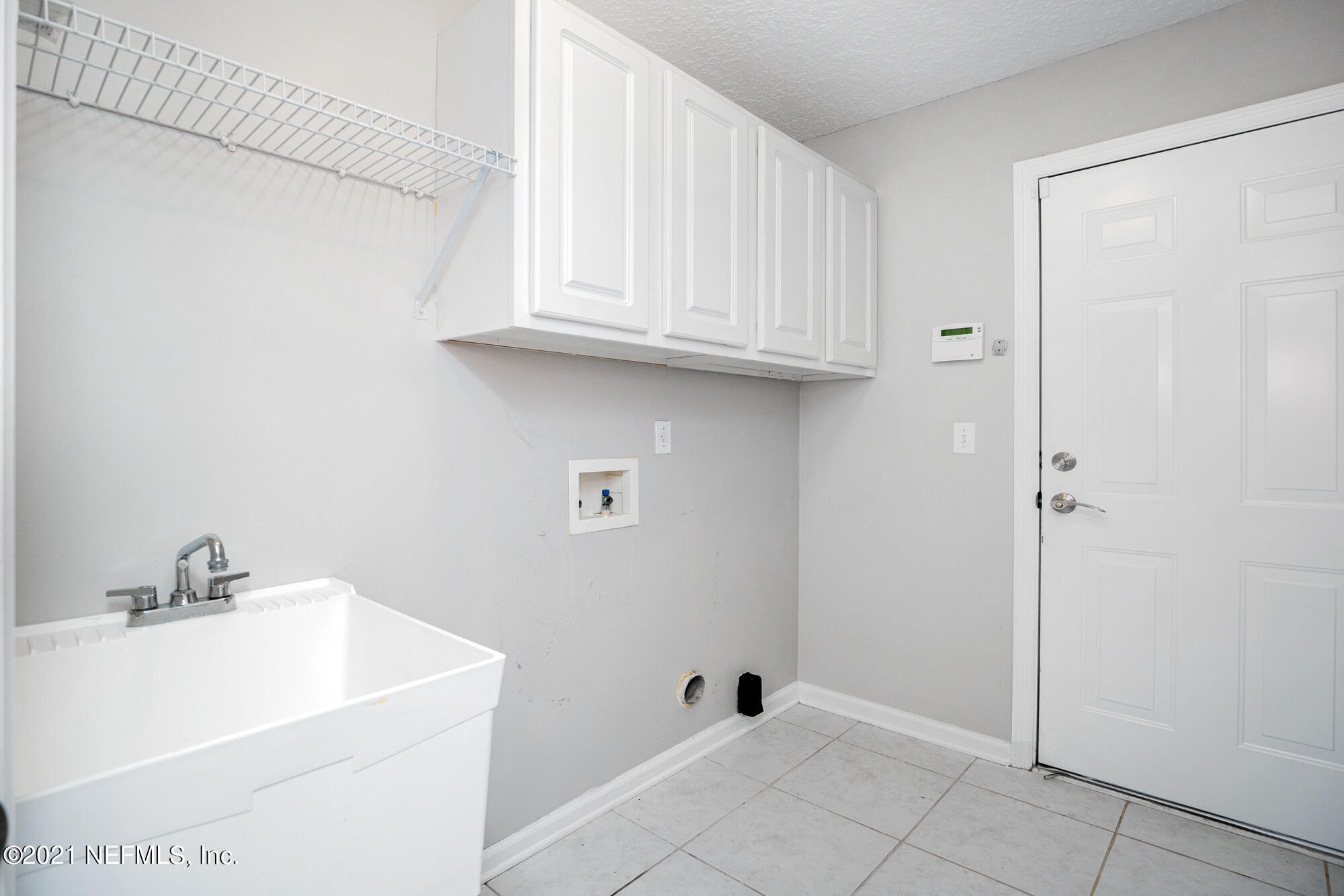 11253 Reed Island Drive Jacksonville, FL 32225 - Photo 28 of 42 a bath room with a sink