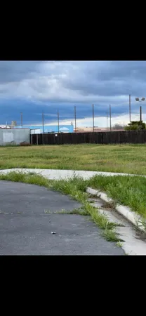 a view of a road with a yard