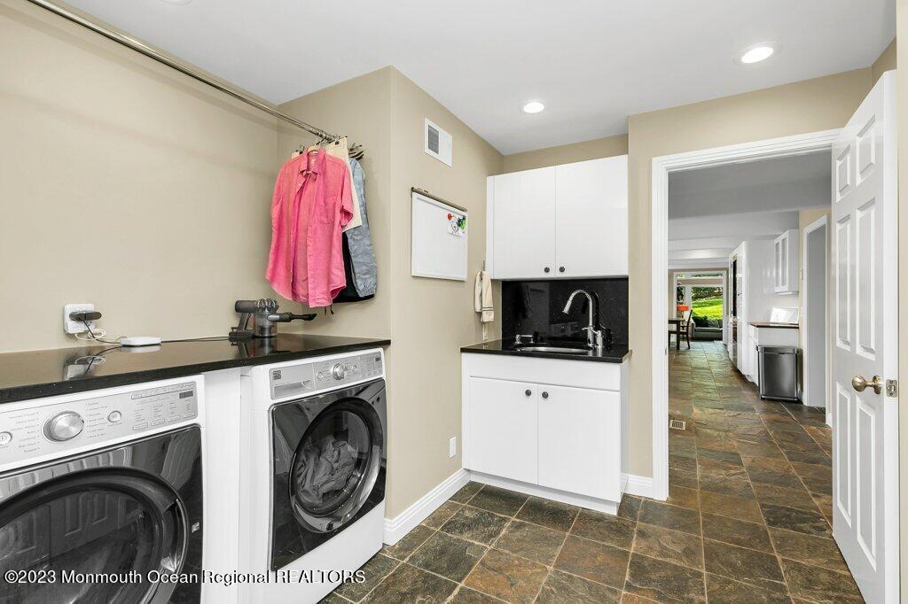 17 Club Way Red Bank, NJ 07701 - Photo 11 of 72 a view of living room with washer and dryer