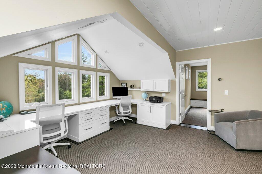 17 Club Way Red Bank, NJ 07701 - Photo 34 of 72 a large white room with a large window and furniture