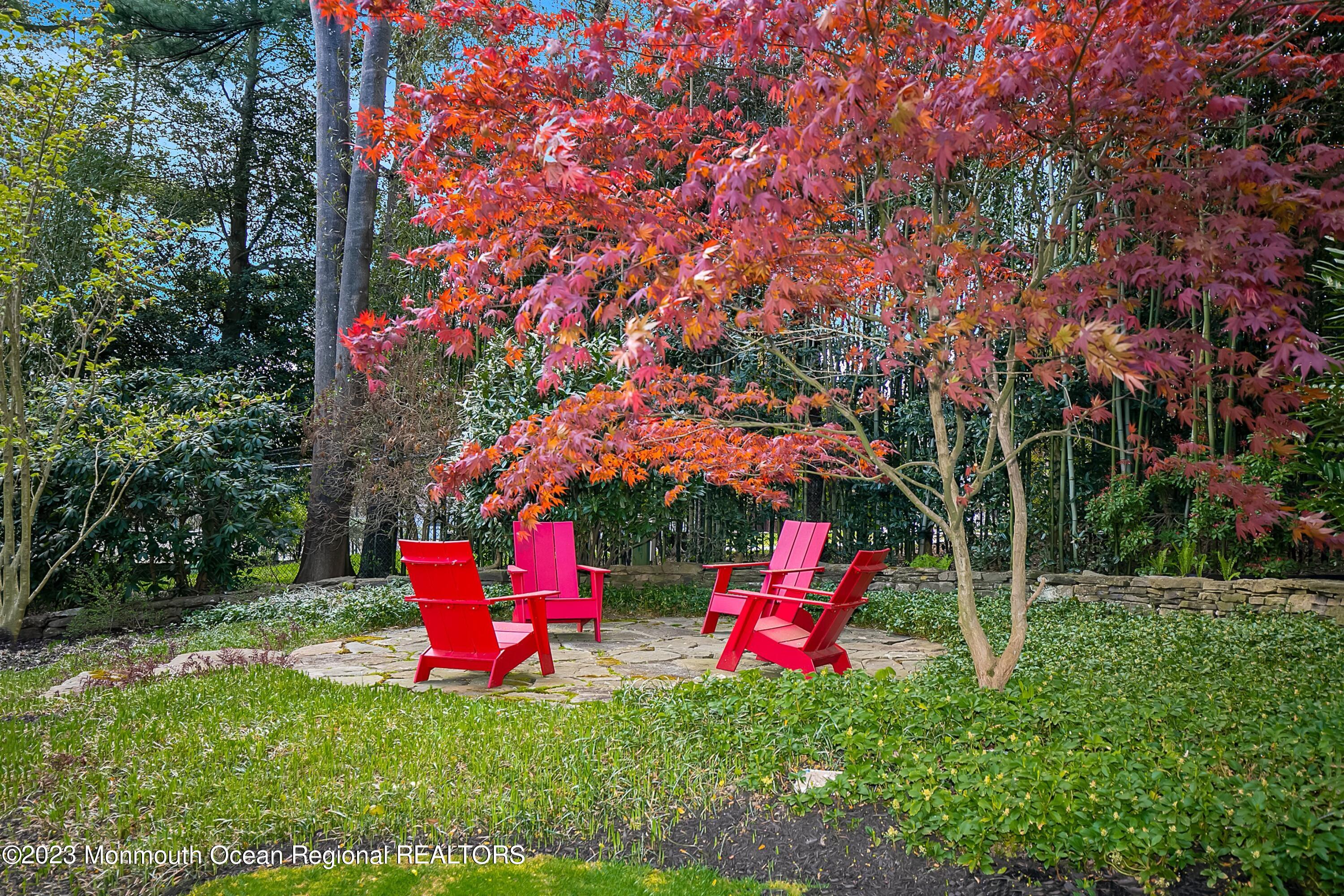 17 Club Way Red Bank, NJ 07701 - Photo 47 of 72 a backyard of a house with seating space