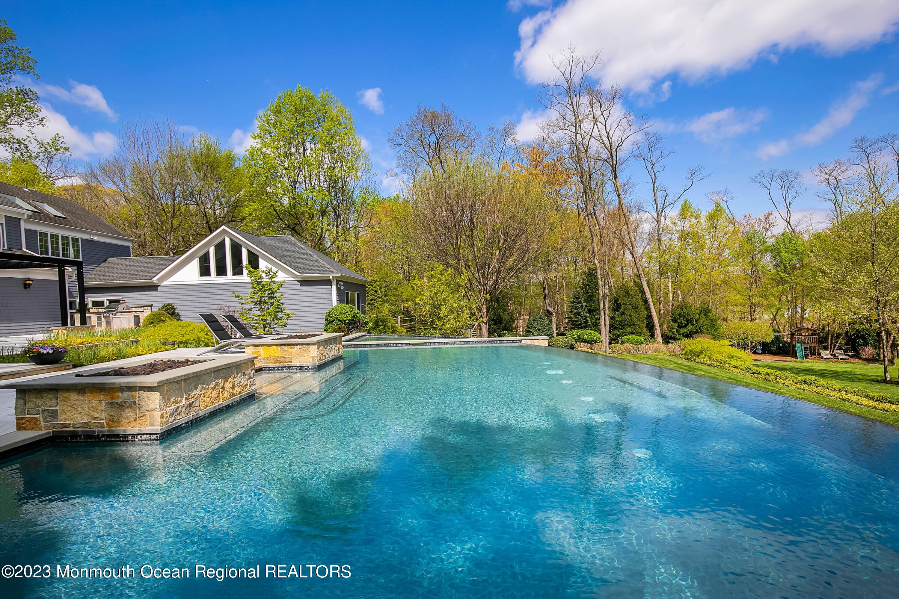 17 Club Way Red Bank, NJ 07701 - Photo 51 of 72 a view of swimming pool with outdoor seating and yard