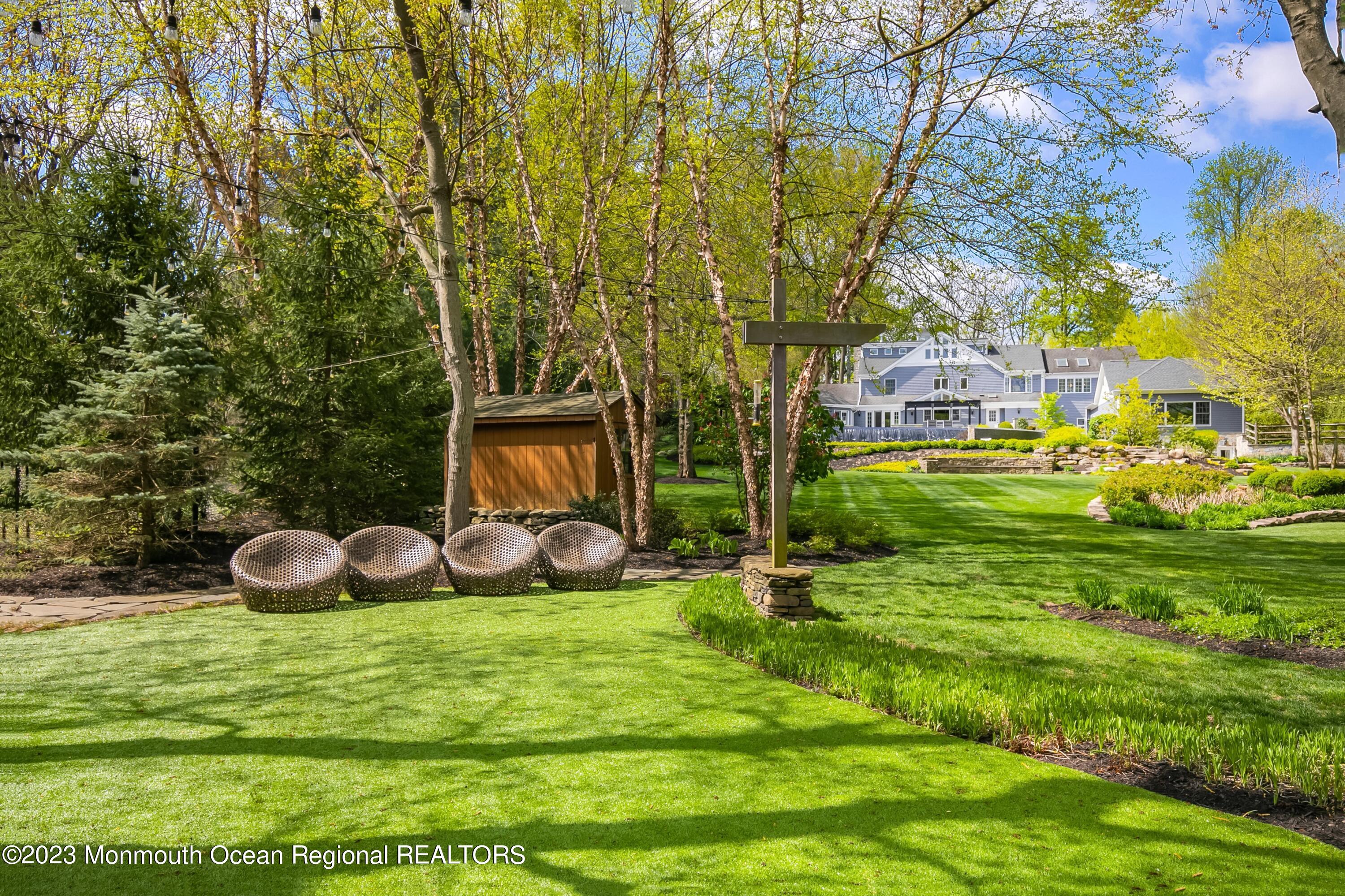 17 Club Way Red Bank, NJ 07701 - Photo 57 of 72 a view of a golf course with chairs