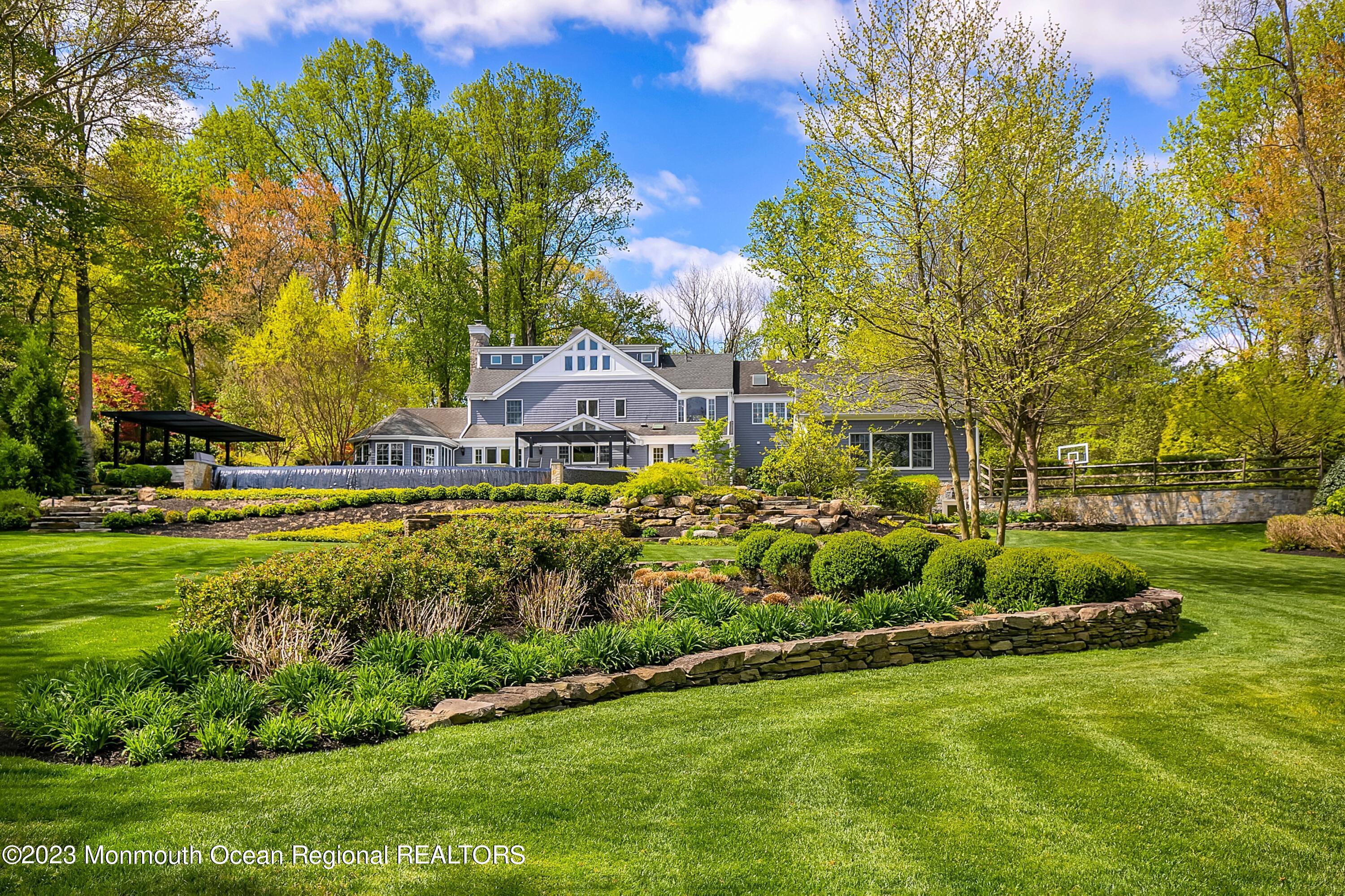 17 Club Way Red Bank, NJ 07701 - Photo 64 of 72 a front view of a house with a garden