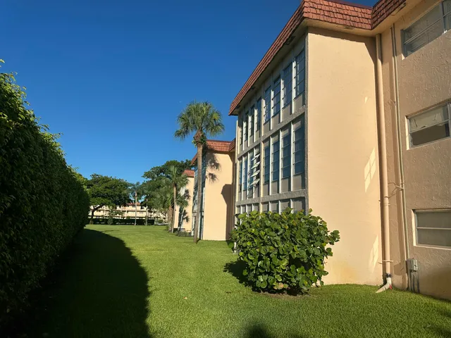 a view of a house with a garden