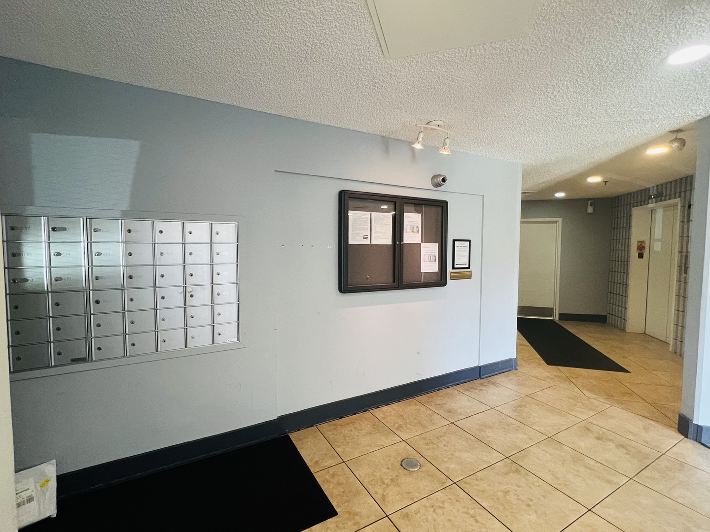 1750 North Marywood Avenue, Unit 315 Aurora, IL 60505 - Photo 15 of 20 a hallway with a large window