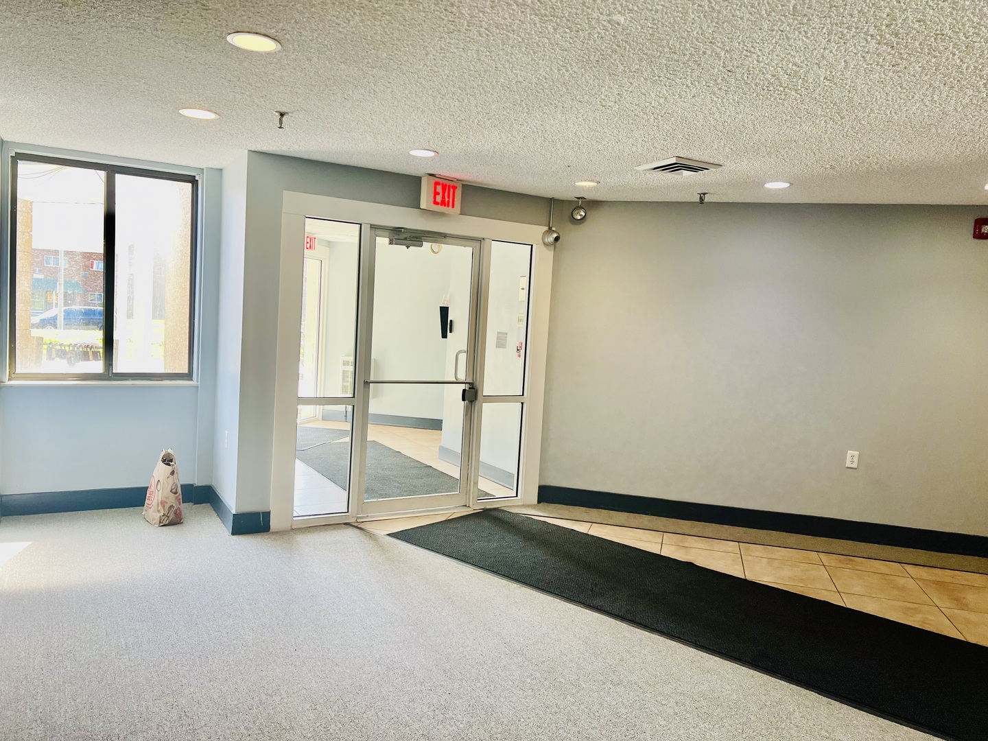 1750 North Marywood Avenue, Unit 315 Aurora, IL 60505 - Photo 16 of 20 a view of an empty room with a window