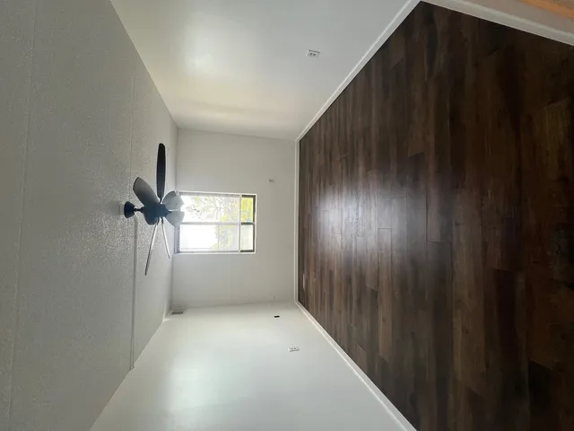 a view of hallway with stairs