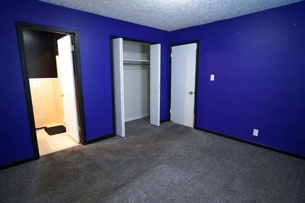 a view of empty room with windows