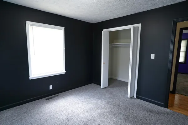 an empty room with windows