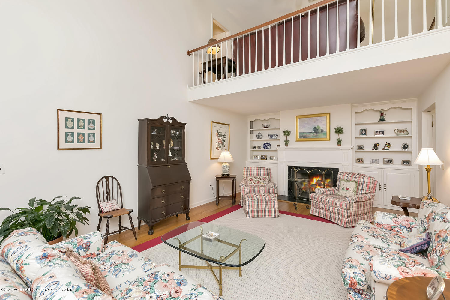 1 Berkeley Square Brielle, NJ 08730 - Photo 12 of 28 a living room with furniture and a fireplace