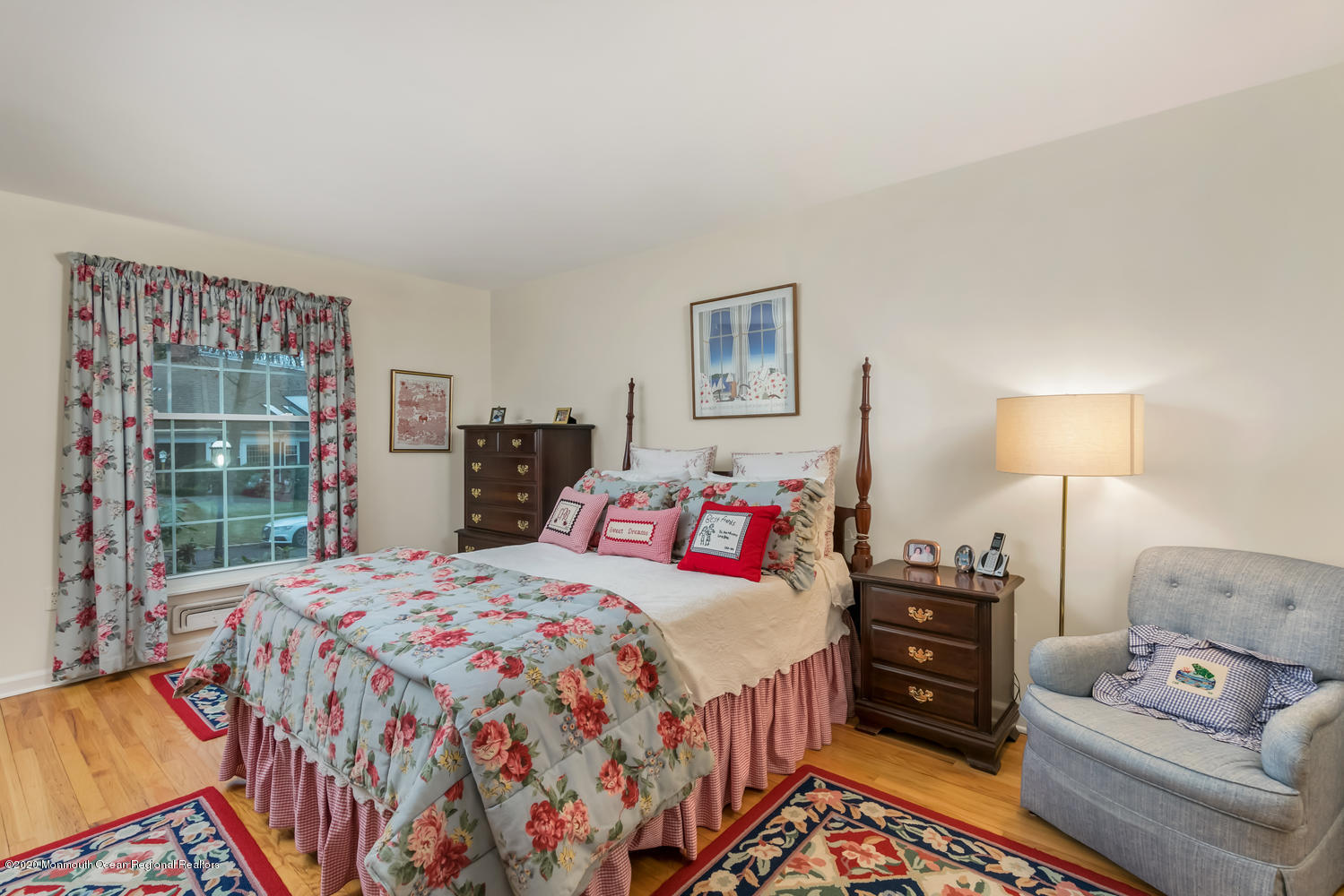 1 Berkeley Square Brielle, NJ 08730 - Photo 16 of 28 a bedroom with a bed and wooden floor