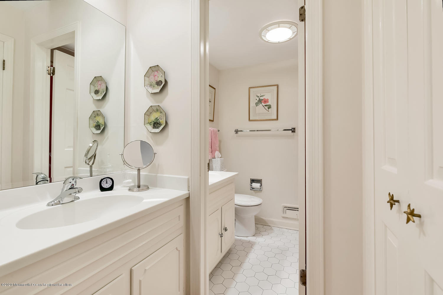 1 Berkeley Square Brielle, NJ 08730 - Photo 17 of 28 a bathroom with a sink a toilet and shower