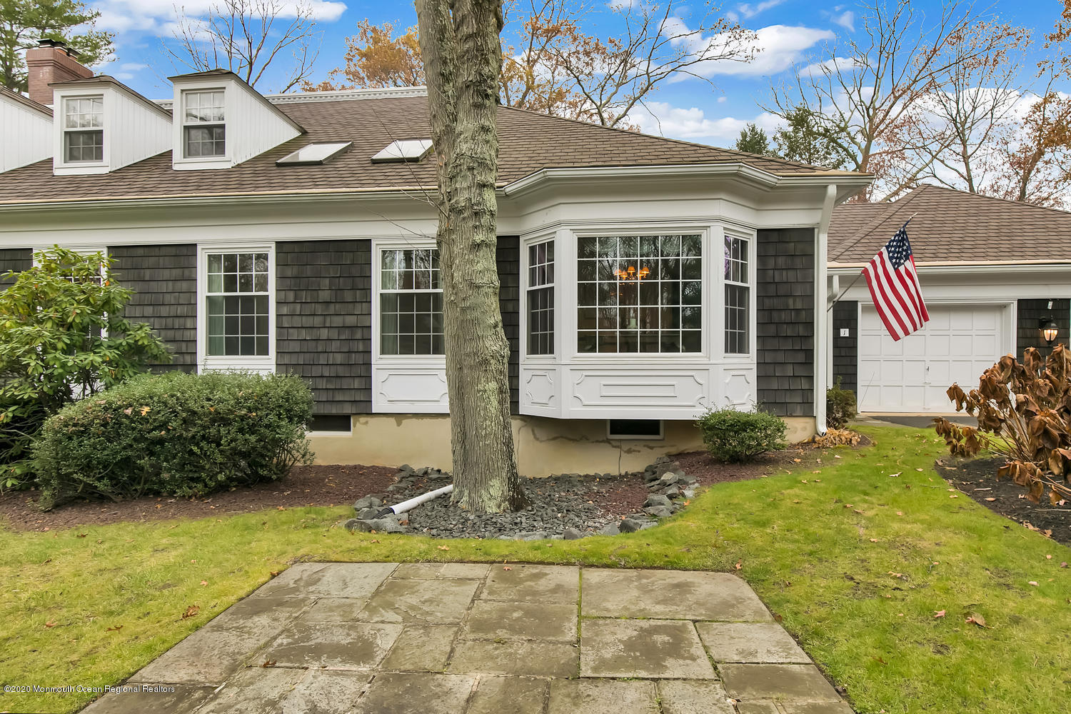 1 Berkeley Square Brielle, NJ 08730 - Photo 2 of 28 front view of a house with a yard