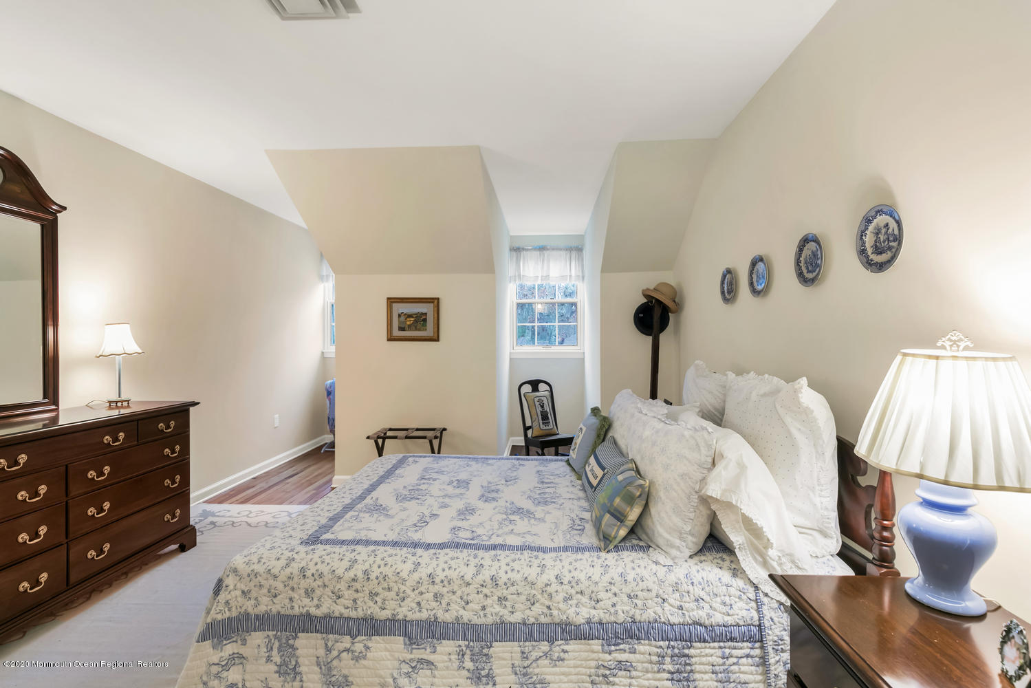1 Berkeley Square Brielle, NJ 08730 - Photo 22 of 28 a bedroom with a bed and a dresser
