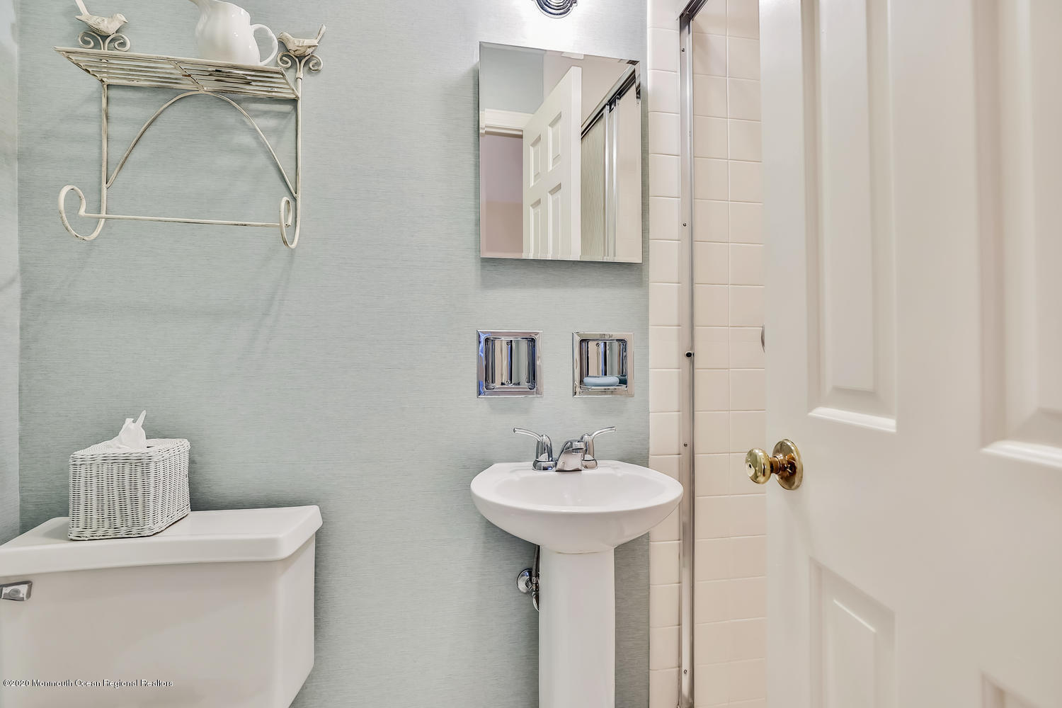 1 Berkeley Square Brielle, NJ 08730 - Photo 23 of 28 a bathroom with a sink toilet and mirror