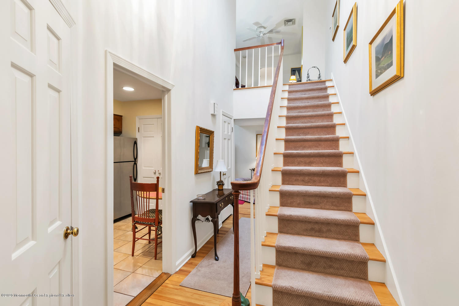 1 Berkeley Square Brielle, NJ 08730 - Photo 5 of 28 a view of entryway and hall with wooden floor