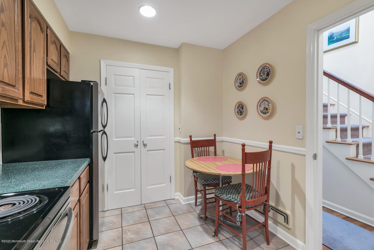 1 Berkeley Square Brielle, NJ 08730 - Photo 8 of 28 a kitchen with a table and chairs