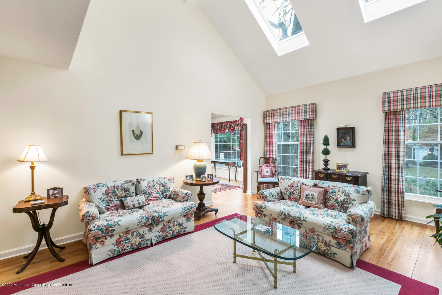 1 Berkeley Square Brielle, NJ 08730 - Photo 9 of 28 a living room with furniture a lamp and a large window